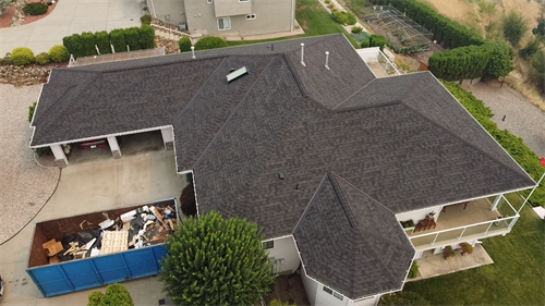 New shingle installation on single story residential property