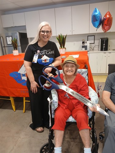 Celebrating with BIG scissors!