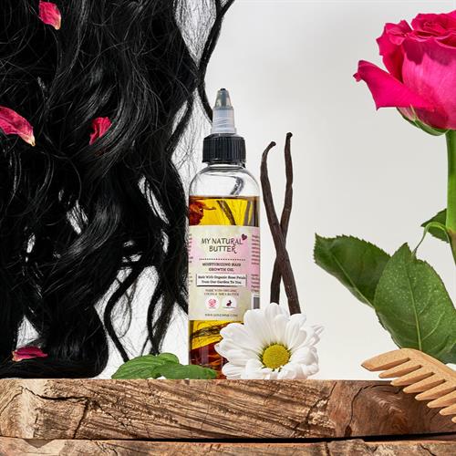 Moisturizing Hair Growth Oil — formulated to nourish the scalp and support healthy growth.