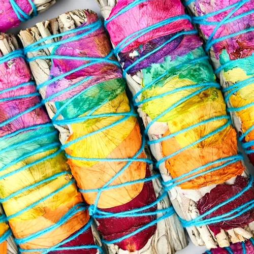 "Smudge It’ Sage Bundles — crafted with colorful petals for cleansing and intentional living.