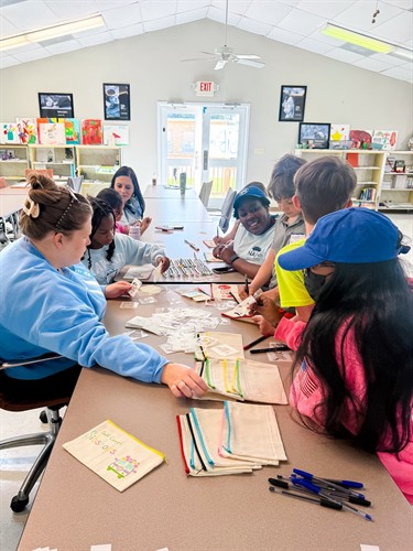 Members of JA of Gulfport assisting with our Sibshop on March 14, 2026.