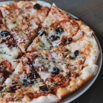 Wood-brick oven housemade pizzas