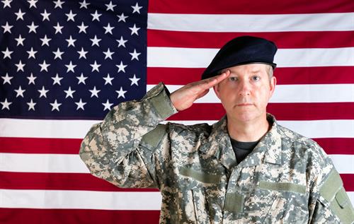 Gallery Image disabled-veteran-saluting-the-american-flag.jpeg