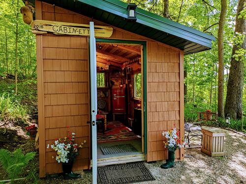 Cabin-ette that seats 4 with a mini-fridge and microwave