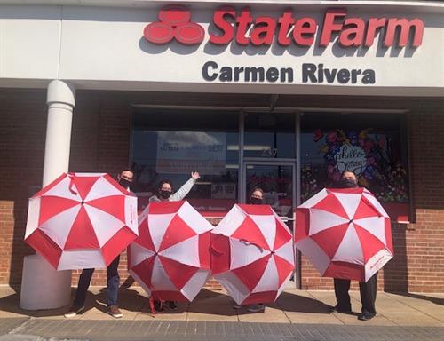 State Farm Umbrellas for the Schools Kiss and Ride Lanes