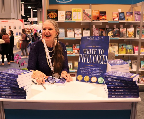 Colonel Bass signnig books at ALA convention in D.C.