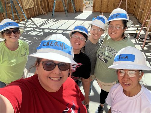 Our employees volunteering at Habitat for Humanity