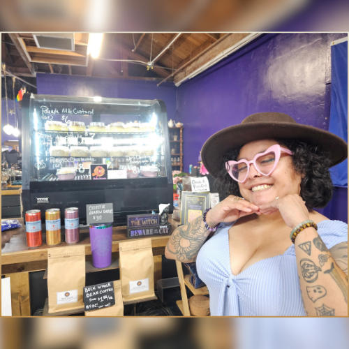 The Love Brujita in front of our pastry display!