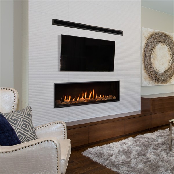 Linear Fireplaces give you that modern look and leave lots of room for a tv :)