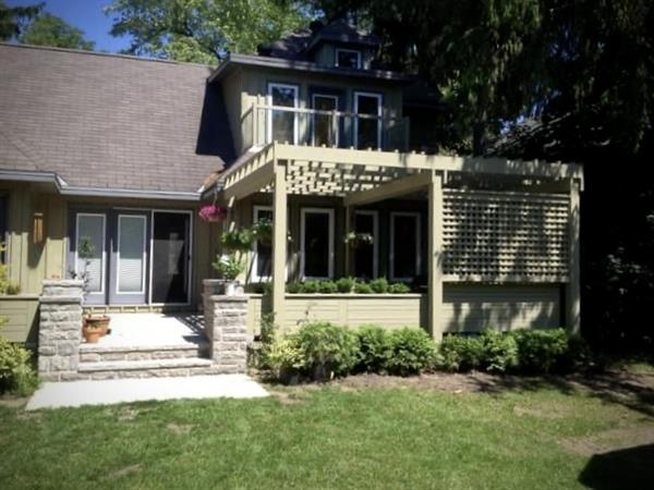 Custom pergola, lattice, and masonry