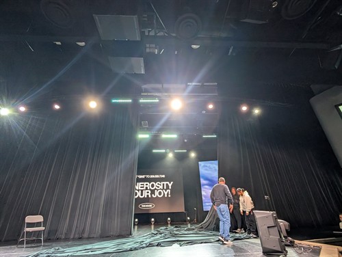 Stage lighting, video wall, and drapery installation