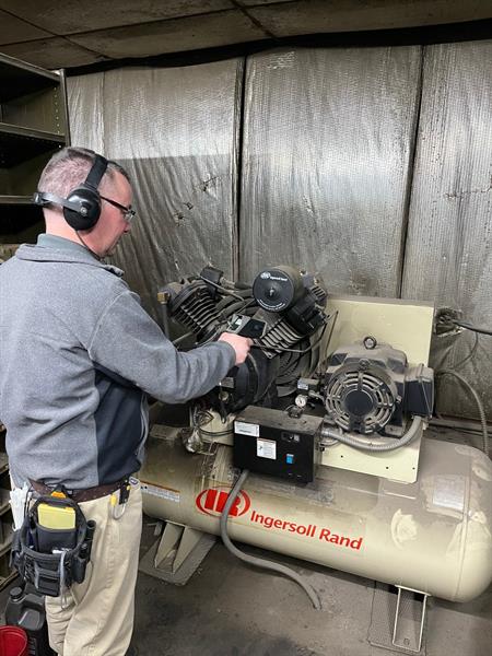 Dan Nickey conducting a compressed air audit