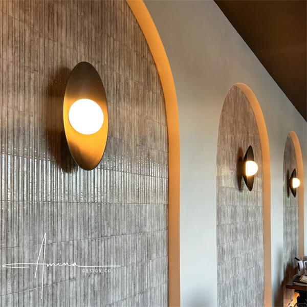 Curve 3D tile and Joni wall sconce from Stone & Stile