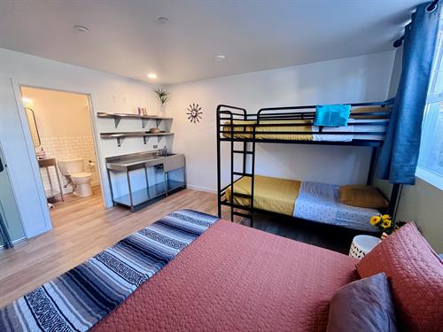 Our private rooms feature a queen bed and 1 twin/twin bunkbed with ensuite bathroom that are perfect for families. Our private rooms feature a queen bed and 1 twin/twin bunkbed with ensuite bathroom that are perfect for families.