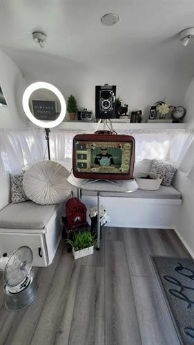 Vintage camera decor in an all white interior.