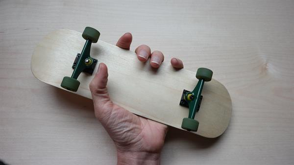 Hand-sized skateboards