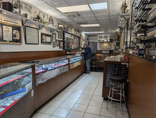 Inside Oakton Coins & Collectibles in Skokie, where customers receive one-on-one evaluations for coins, bullion, jewelry, paper money, and estate collections.