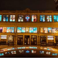 Uptown Neighborhood Brings Light and Beauty through Advent Calendar Window Artwork in December