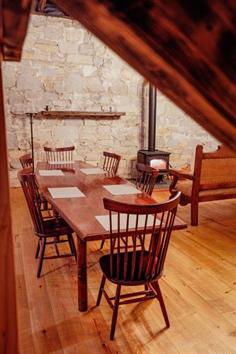 Gather around the large dining room tables with your loved ones. This space can also be used for working and studying.