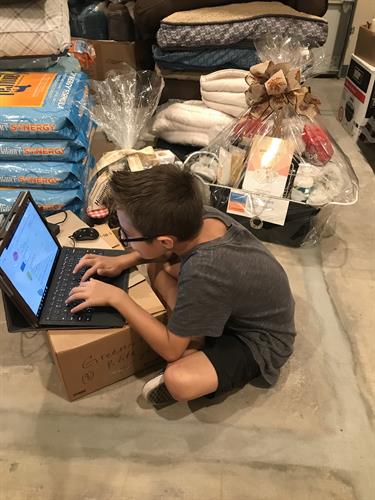 Our youngster team member Skylaar helping with inventory