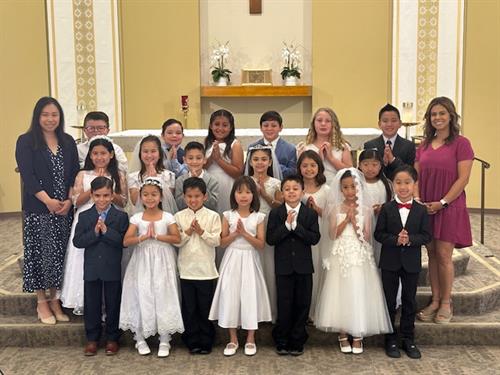 Congratulations to our 2nd grade class on making their 1st Communion!