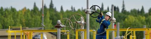 Gallery Image Cenovus_worker-in-facility-at-Christina-Lake_logo-version_Cenovus-Energy-1340x350.jpg