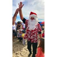 Surfing Santa is coming to Capitola!