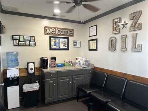 Lobby of shop 2 including water cooler and hot coffee.