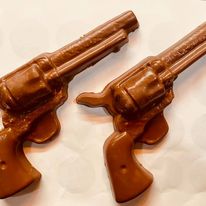 Molded chocolate Wild West pistols