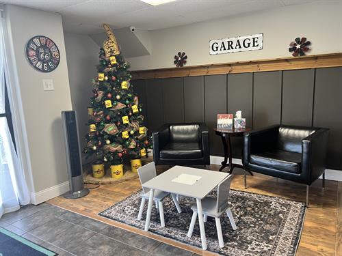 Lobby with children's play table and our famous Pennzoil Tree.