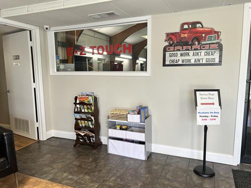 Children's area with reading material, Golden Back Books, cars, coloring books and crayons, and more. 