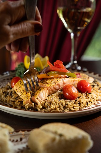 Brightened by fire-roasted peppers, tomatoes and onions, grounded by long grain wild rice. 