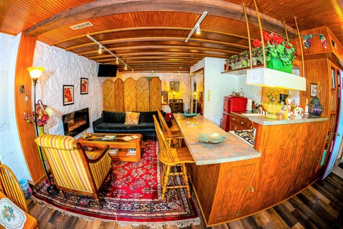 The Zelda Suite Wide Angle View of the Living Room and Kitchen Area