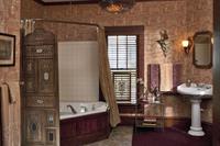 Robt. Louis Stevenson's huge bathroom features a jacuzzi with shower