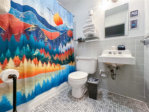 Standard rooms have retro shower/bath combos