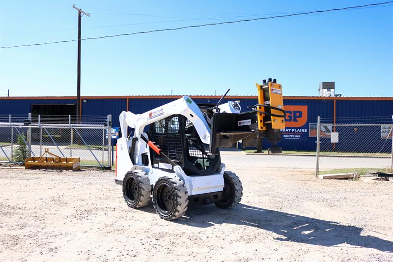 Skid steers and attachments