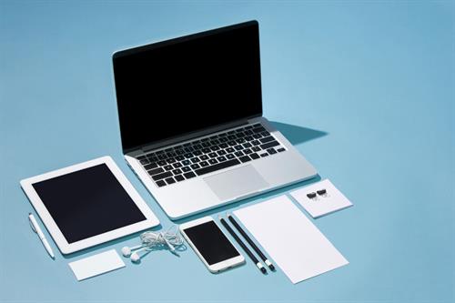 Gallery Image laptop-pens-phone-note-with-blank-screen-table.jpg