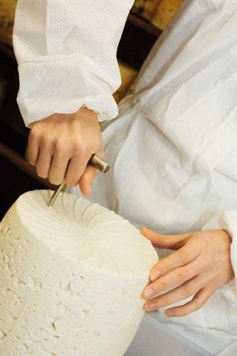 Spiking blue cheese by hand