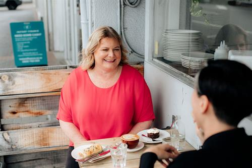 Helen Laidlaw helping clients