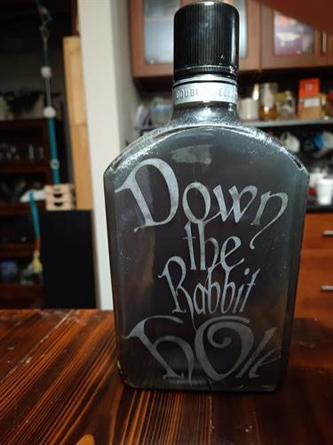 Glass whiskey bottle-engraved