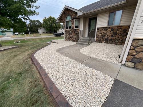 Residential Landscape installation with concrete landscape edging Residential Landscape installation with concrete landscape edging