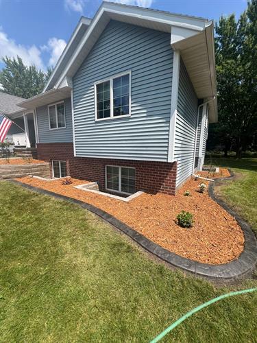 Residential Landscape installation with concrete landscape edging Residential Landscape installation with concrete landscape edging