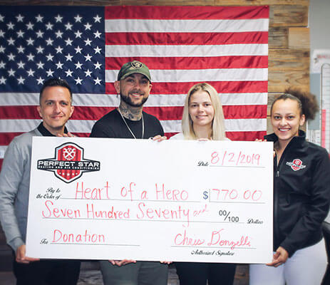 Heart of a Hero Donation Check photo with Perfect Star HVAC Staff 2019 Heart of a Hero Donation Check photo with Perfect Star HVAC Staff 2019
