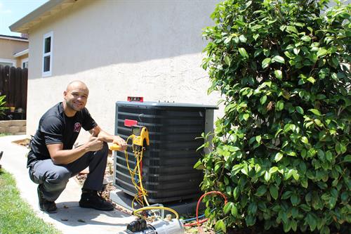 Lead Service Technician, Gilbert Caceres installing a new HVAC system in Antioch, CA