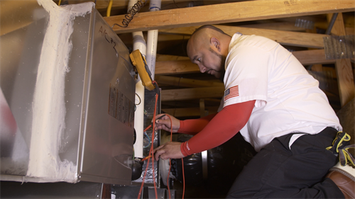 Senior Comfort Adviser, Danny Mendoza servicing a client’s furnace in Brentwood, CA Senior Comfort Adviser, Danny Mendoza servicing a client’s furnace in Brentwood, CA