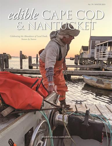 Nantucket bay scalloper Carl Sjolund on the cover of the 2023 Edible Cape Cod & Nantucket winter issue cover - photo by Leah Mojer.