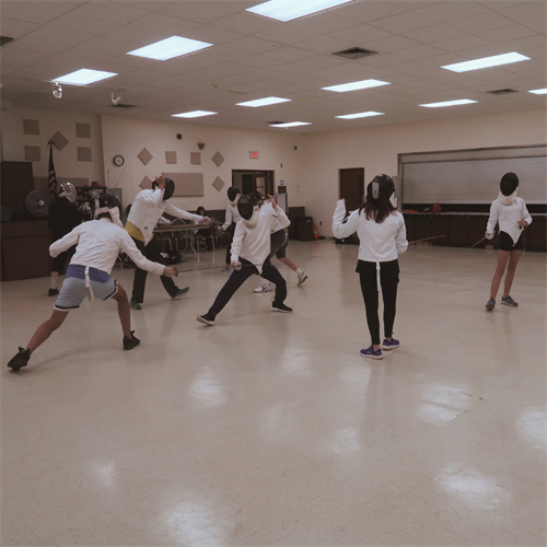 Our intermediate class meets every Tuesday evening for an hour and a half of lessons, open fencing, and fun games!