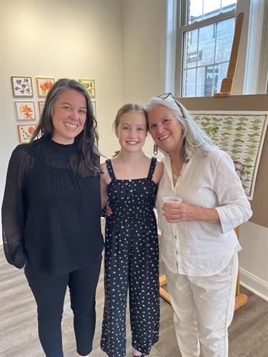 Store owner, Jess, with her daughter and mother at Art & Fiber Gallery's first opening reception.