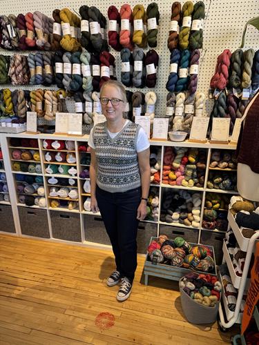 Aran, an Art & Fiber employee and garment maker extraordinaire, displaying a pair of jeans and a sweater that she had recently completed. Aran, an Art & Fiber employee and garment maker extraordinaire, displaying a pair of jeans and a sweater that she had recently completed.