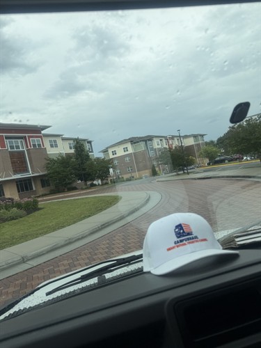 Gallery Image CampusHaul_truck_with_logo_hat.jpeg